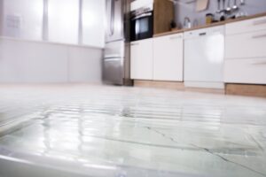 Flooded floor in kitchen from water leak